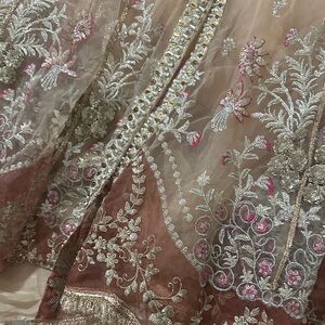 Elegant Embroidered Dress with Silver and Pink Accents